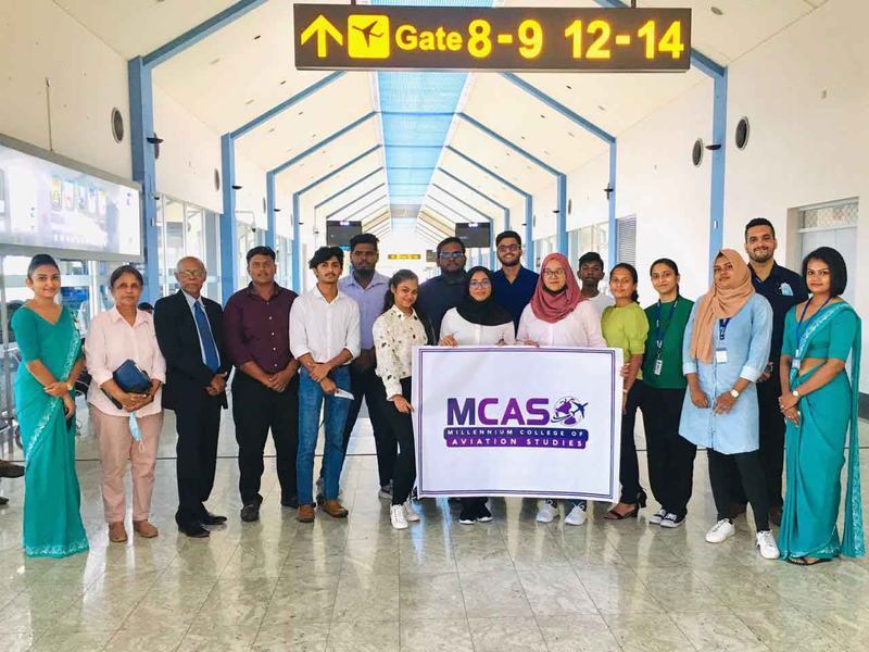 MCAS students at an airport gate