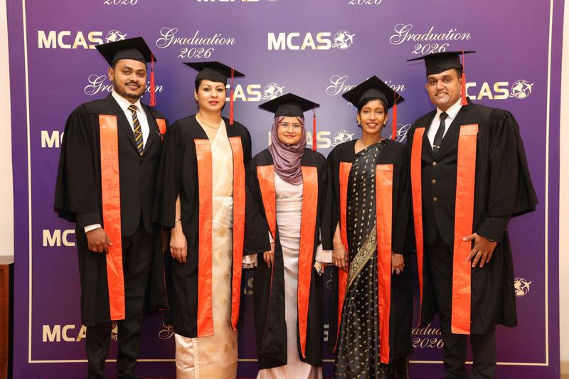 MCAS graduates in academic regalia